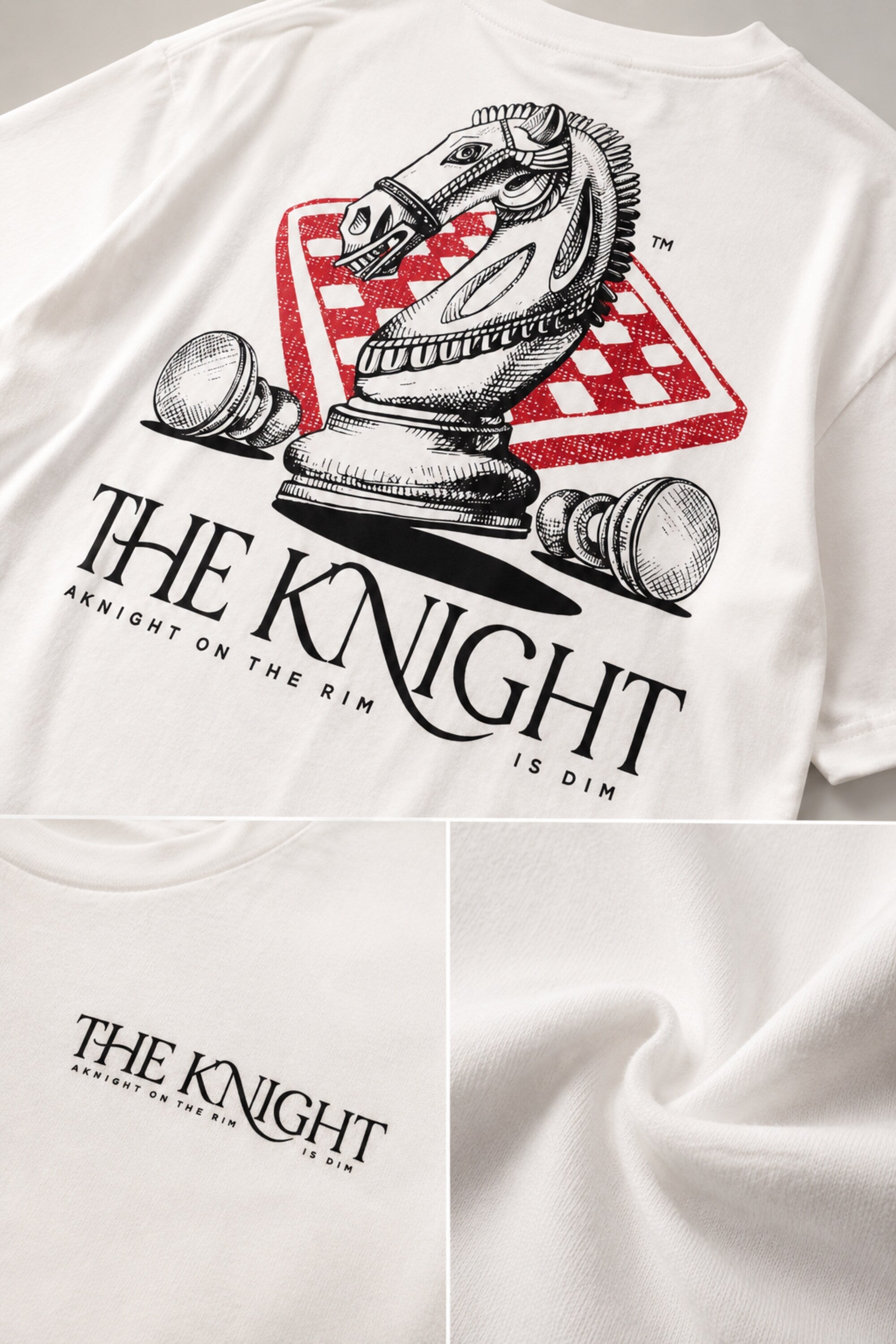 Man wearing a white 'THE KNIGHT' oversized t-shirt and black pants, sitting on concrete stairs. Features short curly hair and white sneakers.