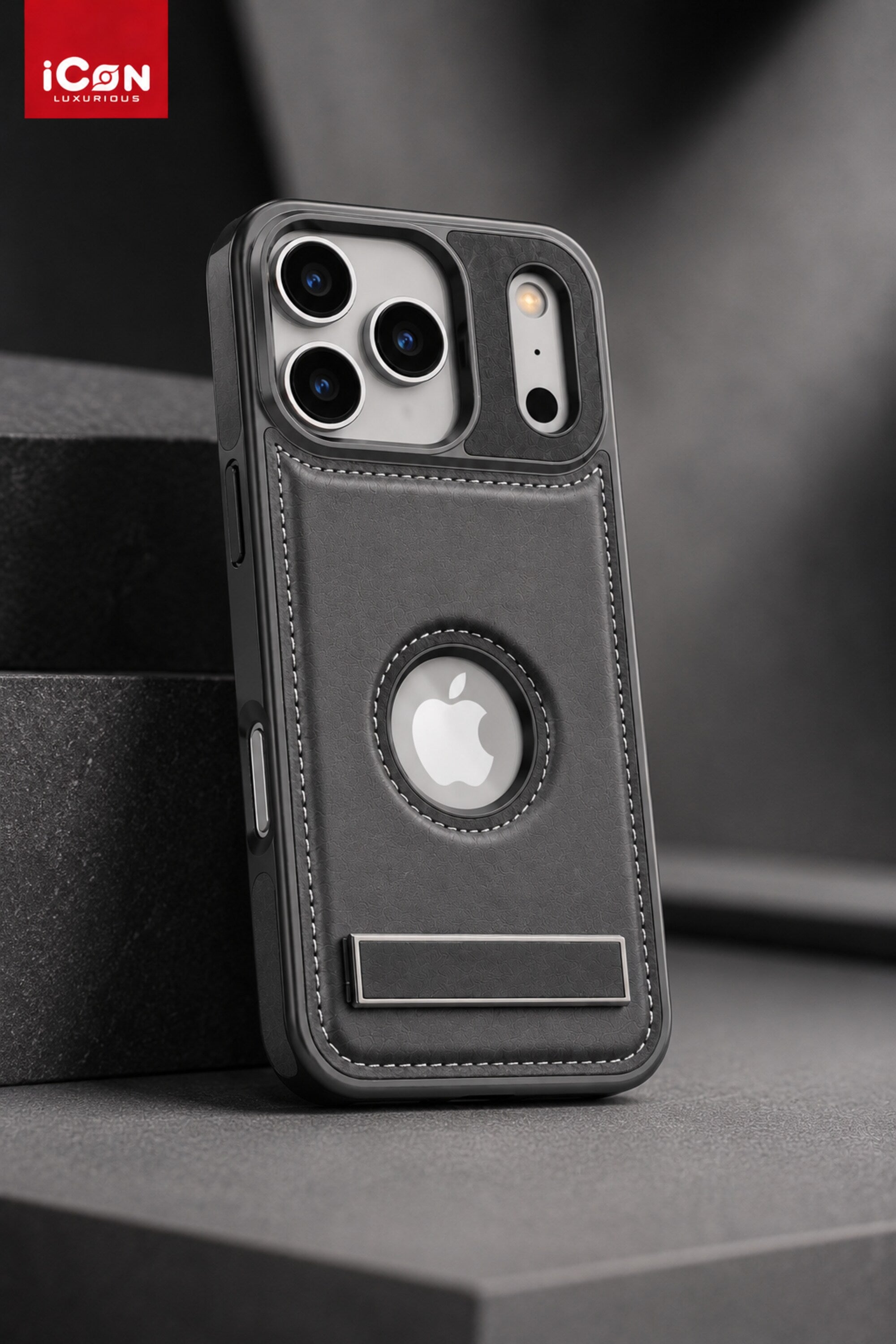 Black phone case with Apple logo on a gray surface, featuring the iCON brand.