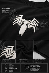 Black t-shirt with white spider logo and puff print details on a black background
