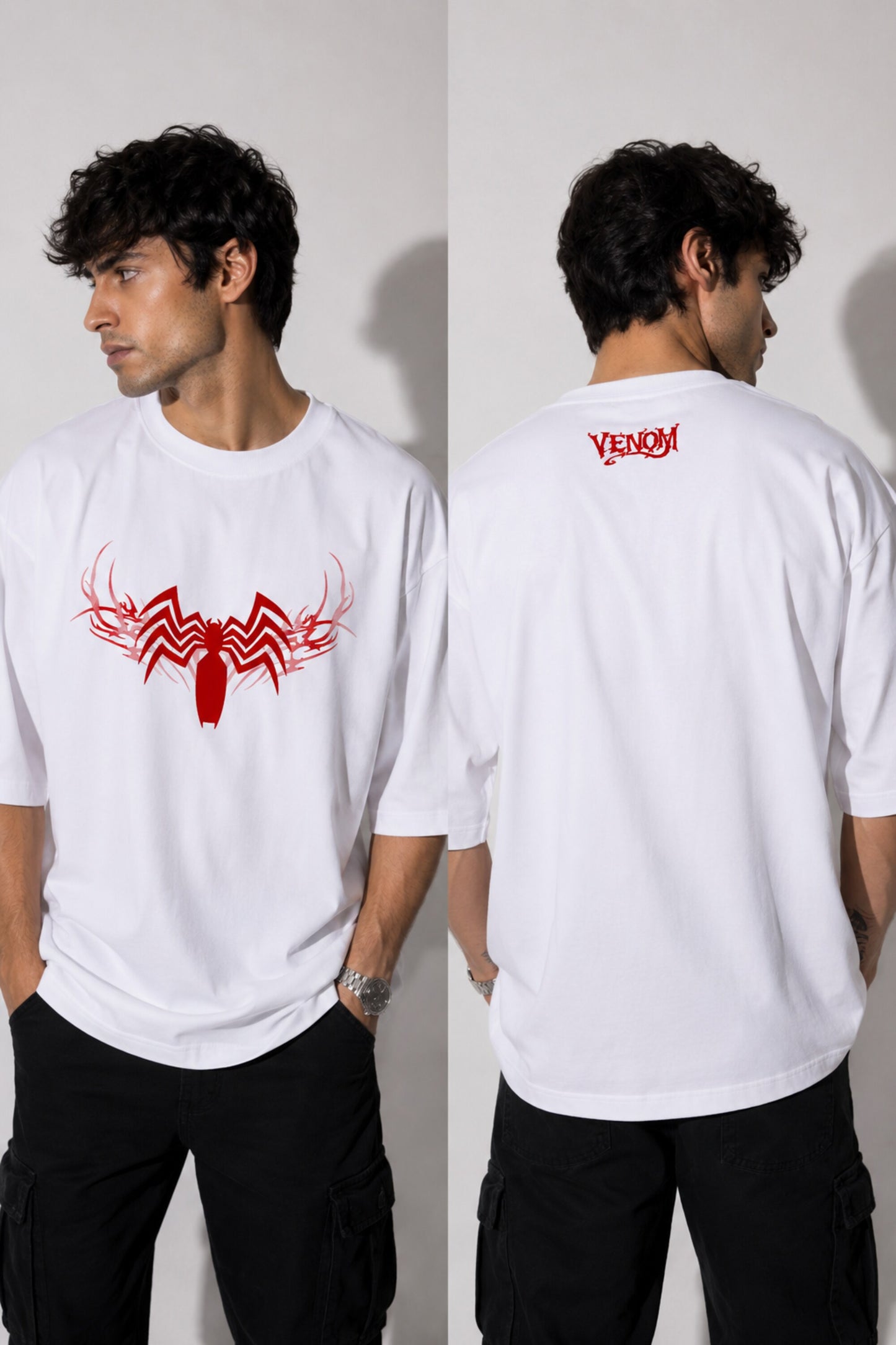 Person wearing a white t-shirt with red graphic design on front and 'Venom' text on back, standing against a plain background.