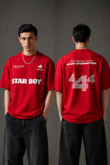Black STAR BOY oversized t-shirt with a light blue raised graphic of a star and text. Detailed fabric texture shown. - red