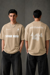 Black STAR BOY oversized t-shirt with a light blue raised graphic of a star and text. Detailed fabric texture shown. - beige