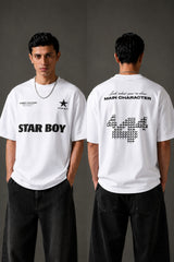 Black STAR BOY oversized t-shirt with a light blue raised graphic of a star and text. Detailed fabric texture shown. - white