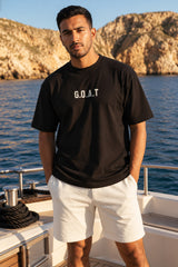 Black oversized tshirt with G.O.A.T 23 red jersey number and Determinos cursive back print, drop shoulder boxy fit, men India