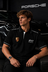 Black Porsche 911 polo t-shirt with Porsche crest badge, 911 text and PORSCHE shoulder panel branding, motorsport India