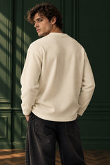 Cream waffle full sleeve boxy tshirt with POSITIVE blue varsity arch and Influence cursive print, henley collar, men India