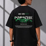 Beige oversized t-shirt featuring a vibrant green Porsche 911 RS RAWK graphic and 'Drifting Club' text. Mockup highlighting premium cotton fabric and stitching details.