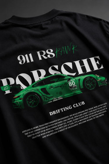 Beige oversized t-shirt featuring a vibrant green Porsche 911 RS RAWK graphic and 'Drifting Club' text. Mockup highlighting premium cotton fabric and stitching details.