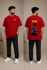 Model wearing a beige RAM oversized t-shirt with a red graphic print on the chest, paired with dark trousers and white sneakers. Showcases streetwear style and premium comfort. - red