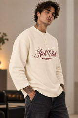 Cream waffle full sleeve boxy tshirt with Rich Club red cursive script print on chest, henley collar, men India