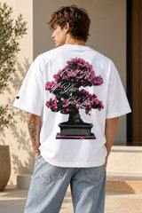 White oversized tshirt with detailed sakura cherry blossom branch in pink and red across chest, drop shoulder boxy fit, men India