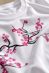 White oversized tshirt with detailed sakura cherry blossom branch in pink and red across chest, drop shoulder boxy fit, men India