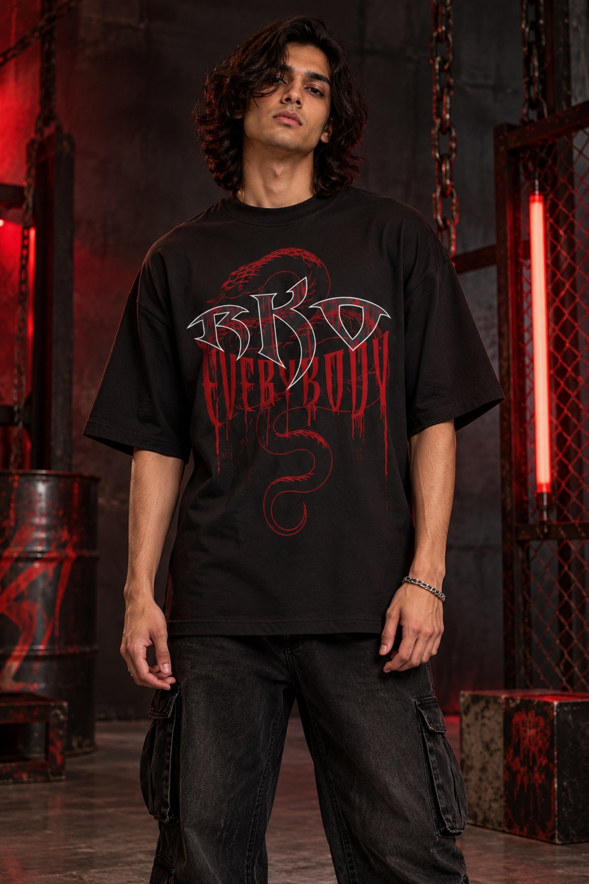 Black oversized tshirt with RKO white logo and Everybody dark red gothic text and snake on front, drop shoulder boxy fit, men India