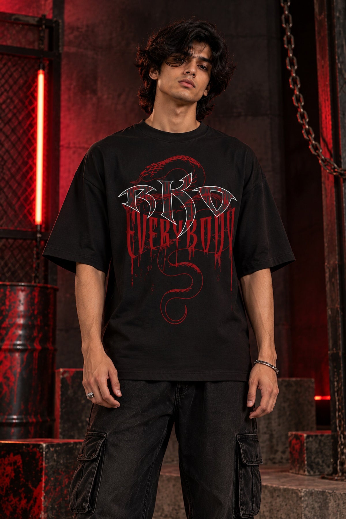 Black oversized tshirt with RKO white logo and Everybody dark red gothic text and snake on front, drop shoulder boxy fit, men India