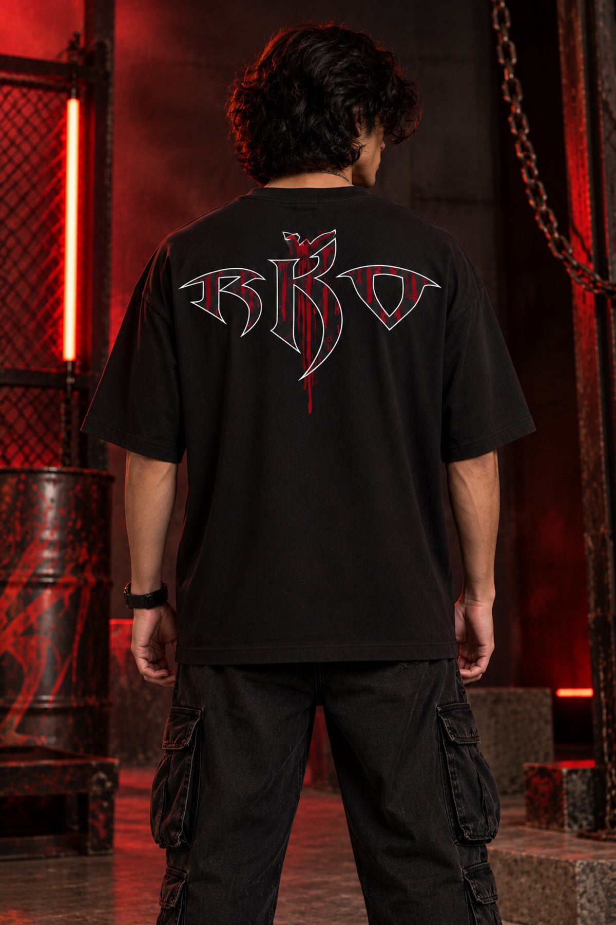 Black oversized tshirt with RKO white logo and Everybody dark red gothic text and snake on front, drop shoulder boxy fit, men India