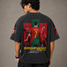 Model wearing a vintage wash dark blue oversized t-shirt with a graphic of Cristiano Ronaldo on the back and "CRISTIANO RONALDO" text on the front.