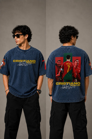 Model wearing a vintage wash dark blue oversized t-shirt with a graphic of Cristiano Ronaldo on the back and "CRISTIANO RONALDO" text on the front.