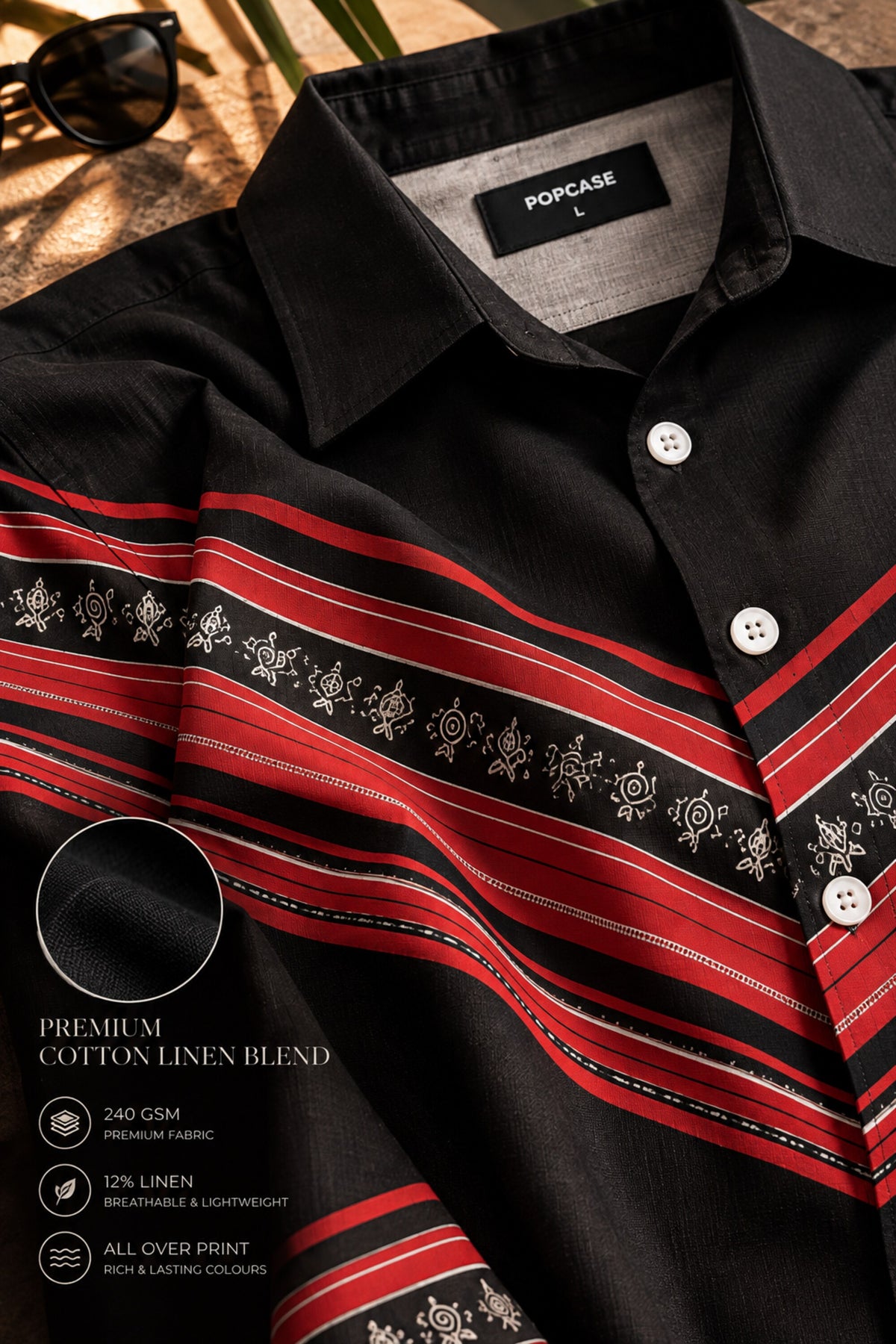 Black Hawaiian shirt with bold red tribal folk art chevron stripe print across chest and sleeves, Cuban collar, men India