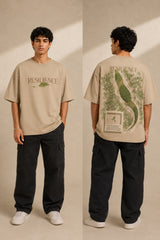 Red oversized t-shirt with "RESILIENCE" embroidered in gold and a green embroidered crocodile graphic. Features a ribbed neckline and premium stitching. - beige