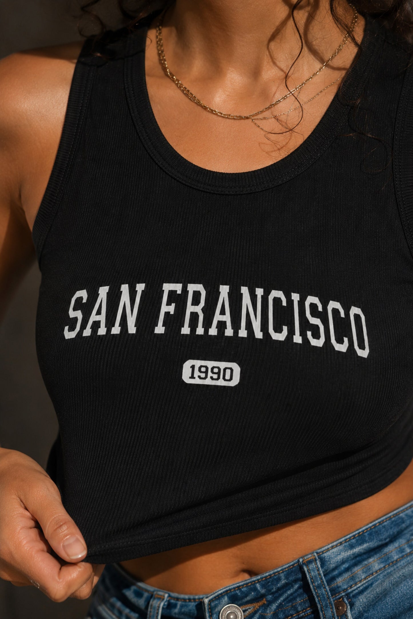 Black ribbed racerback crop tank top with SAN FRANCISCO 1990 collegiate white arch text vintage destination aesthetic women top