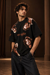 Black oversized tshirt with all-over character face meme print and Hindi text, available in black red beige, drop shoulder boxy fit, men India