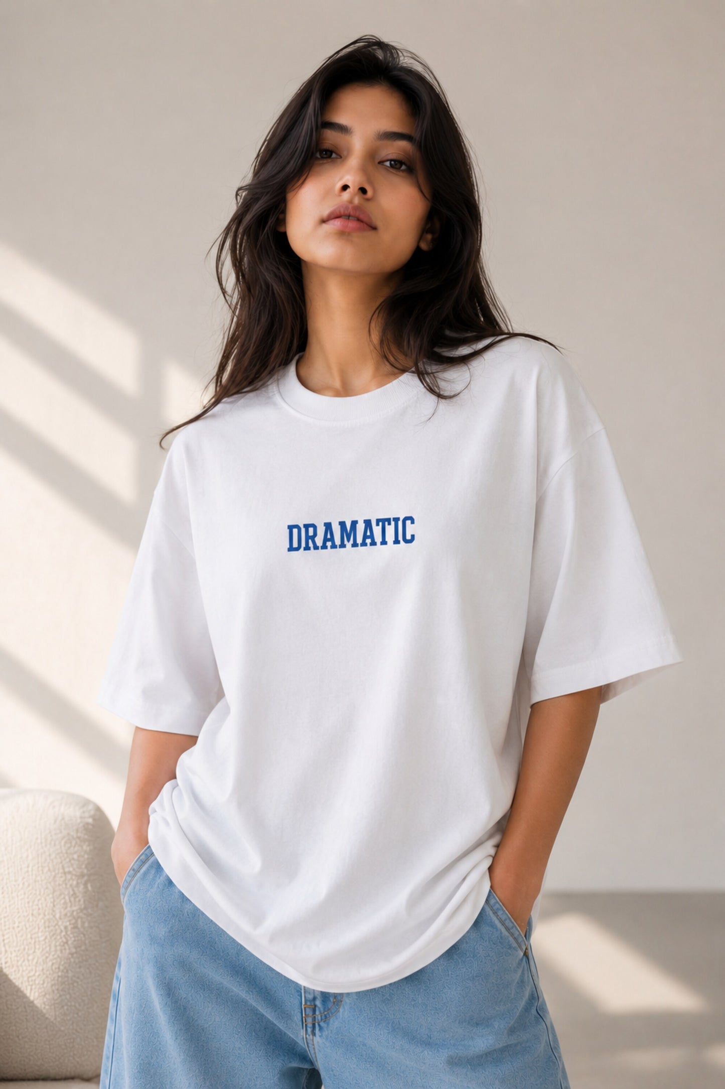 White oversized t-shirt with bold blue DRAMATIC varsity block text front print 220 GSM HD print oversized fit