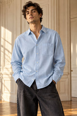 Sky blue minimal full sleeve shirt with small chest pocket and cuffed sleeves, 100% cotton relaxed fit, men India