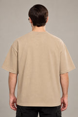Beige oversized tshirt with smoking kills red script and Ferrari F1 racing car No.16 print on front, drop shoulder boxy fit, men India