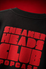 Black oversized t-shirt with Air Jordan 1 Bred sneaker chest graphic illustration