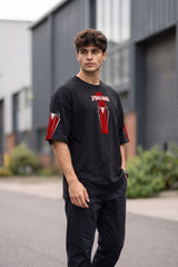 Black oversized tshirt with SPIDER-MAN text and red spider cross icon on chest and red sleeve panels, drop shoulder boxy fit, men India