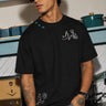POPCASE Stay Weird black oversized graphic t shirt with skeleton guitarist and graffiti print streetwear