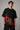Black oversized t-shirt featuring a powerful Shiv Shakti graphic in red and grey. DTF print highlights vibrant colors and durable quality. - black