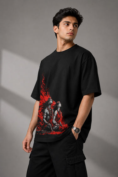 Black oversized t-shirt featuring a powerful Shiv Shakti graphic in red and grey. DTF print highlights vibrant colors and durable quality.