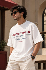 White oversized tshirt with THECOUTURECLUB dark maroon text and Endless Summer cursive print on chest, drop shoulder boxy fit, men India
