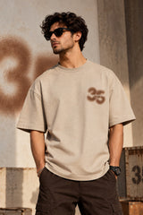 Beige oversized tshirt with bold number 35 and Thirtyfive branding on chest, drop shoulder boxy fit, men India - beige