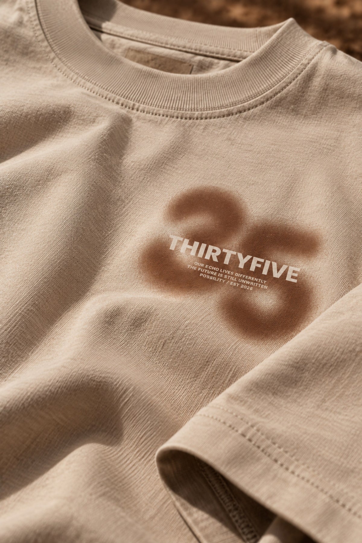 Beige oversized tshirt with bold number 35 and Thirtyfive branding on chest, drop shoulder boxy fit, men India
