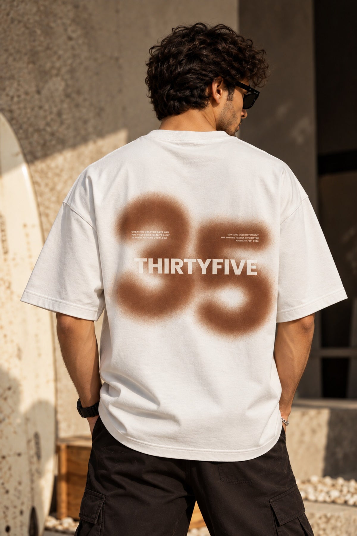 Beige oversized tshirt with bold number 35 and Thirtyfive branding on chest, drop shoulder boxy fit, men India - white