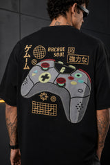 Black oversized t-shirt with retro golden game controller and Japanese passion kanji print, gamer streetwear India