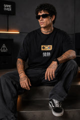 Black oversized t-shirt with retro golden game controller and Japanese passion kanji print, gamer streetwear India