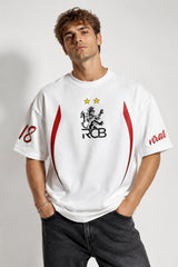 White oversized t-shirt with RCB Royal Challengers Bangalore lion crest number 18 and virat red cursive on sleeves red side stripes
