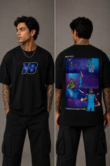 Man wearing a white VIRAT MCG 18 Vs PAK oversized t-shirt with a blue galaxy-themed '18' graphic. He is sitting on steps, showcasing the relaxed fit and streetwear style. - black