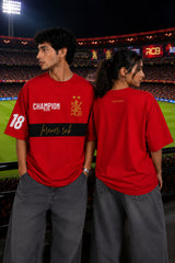 Black oversized t-shirt with RCB Champion 2026 gold lion crest forever rcb red stripe and number 18 on sleeve 220 GSM DTF - red