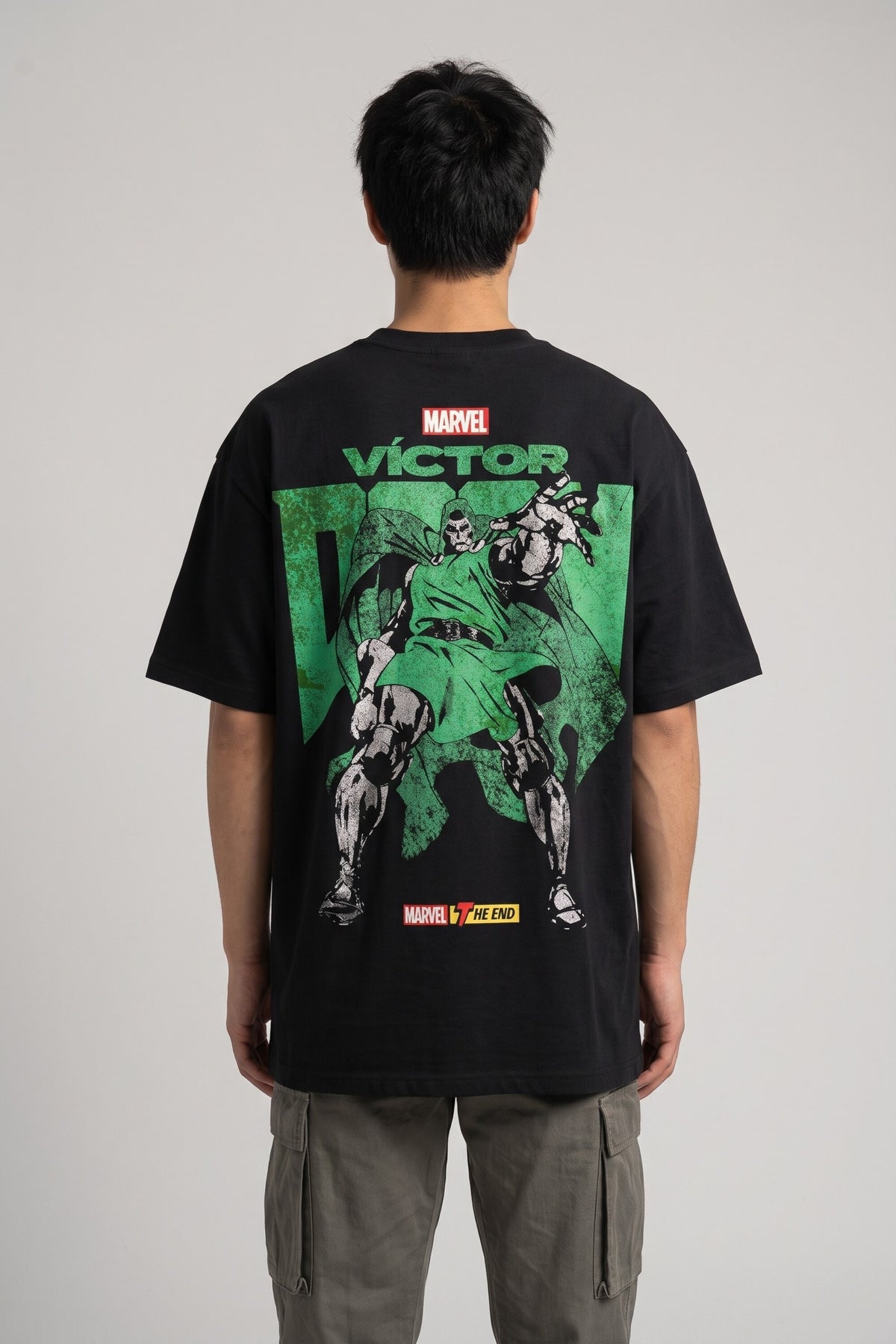 Black oversized tshirt with Marvel logo bold VICTOR green text and Dr Doom full-body illustration on back, drop shoulder boxy fit, men India - doom design shot 3