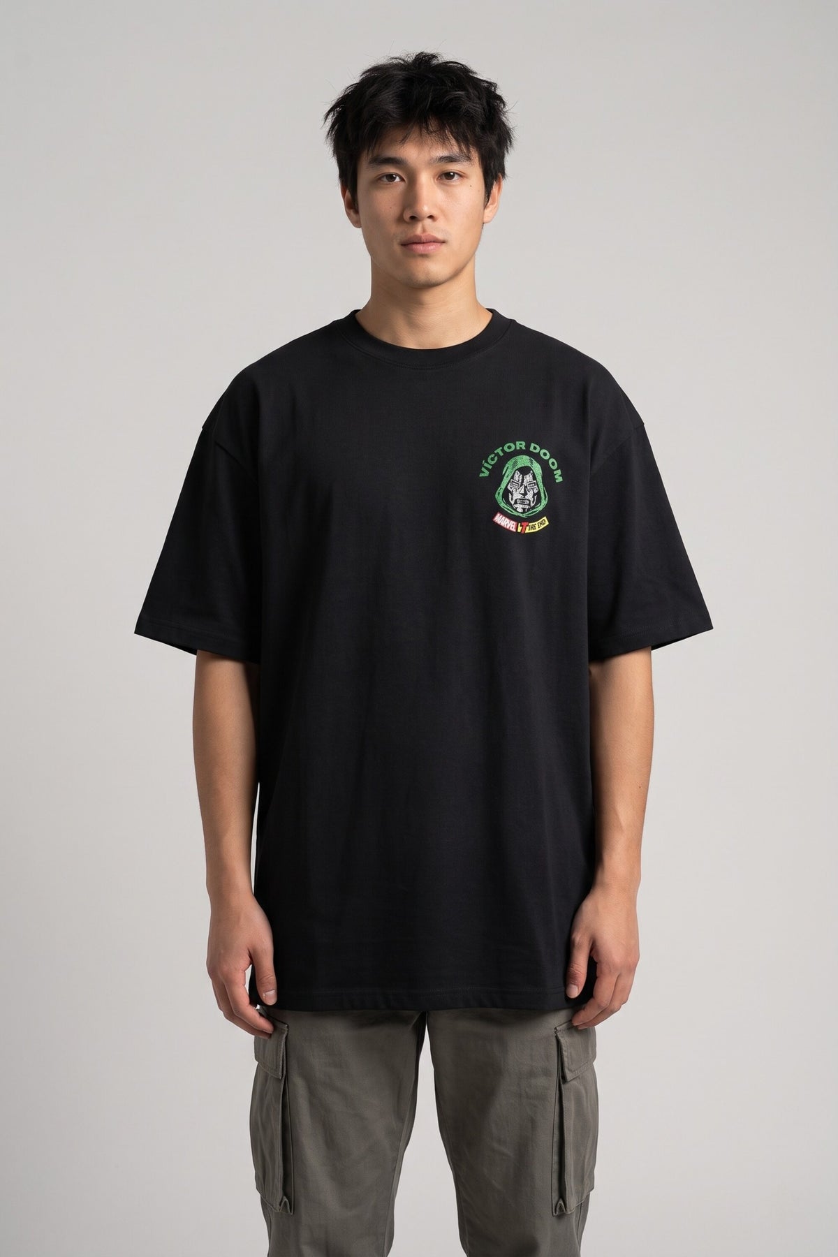 Black oversized tshirt with Marvel logo bold VICTOR green text and Dr Doom full-body illustration on back, drop shoulder boxy fit, men India - doom design shot 4