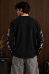 Black waffle full sleeve boxy fit tshirt with henley collar and white cursive script sleeve print, men India