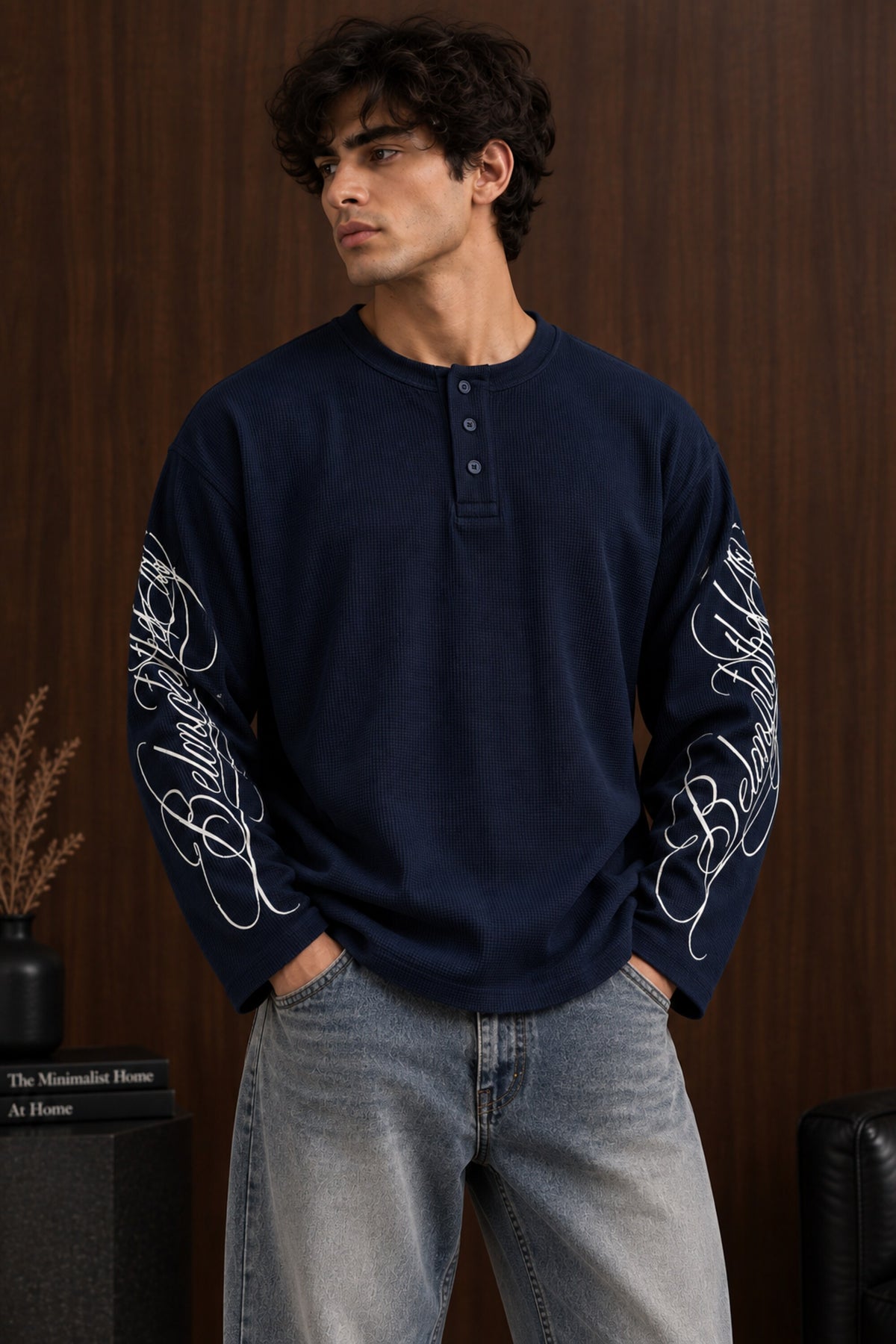 Black waffle full sleeve boxy fit tshirt with henley collar and white cursive script sleeve print, men India - blue
