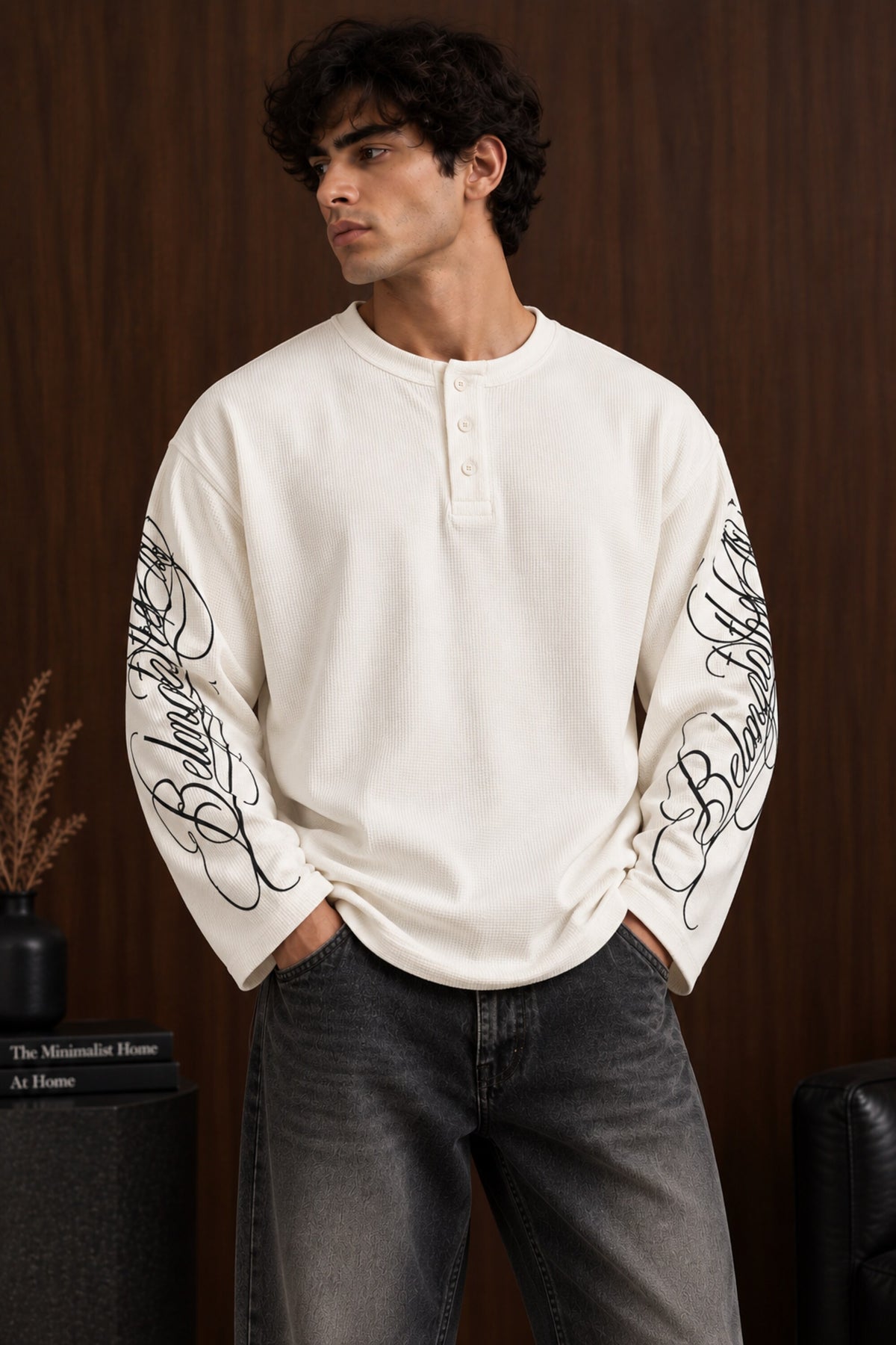 Black waffle full sleeve boxy fit tshirt with henley collar and white cursive script sleeve print, men India - white