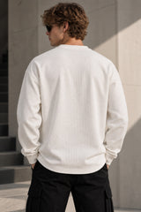 White waffle full sleeve tshirt with boxy fit, henley collar and Munich cursive script print on chest, men India