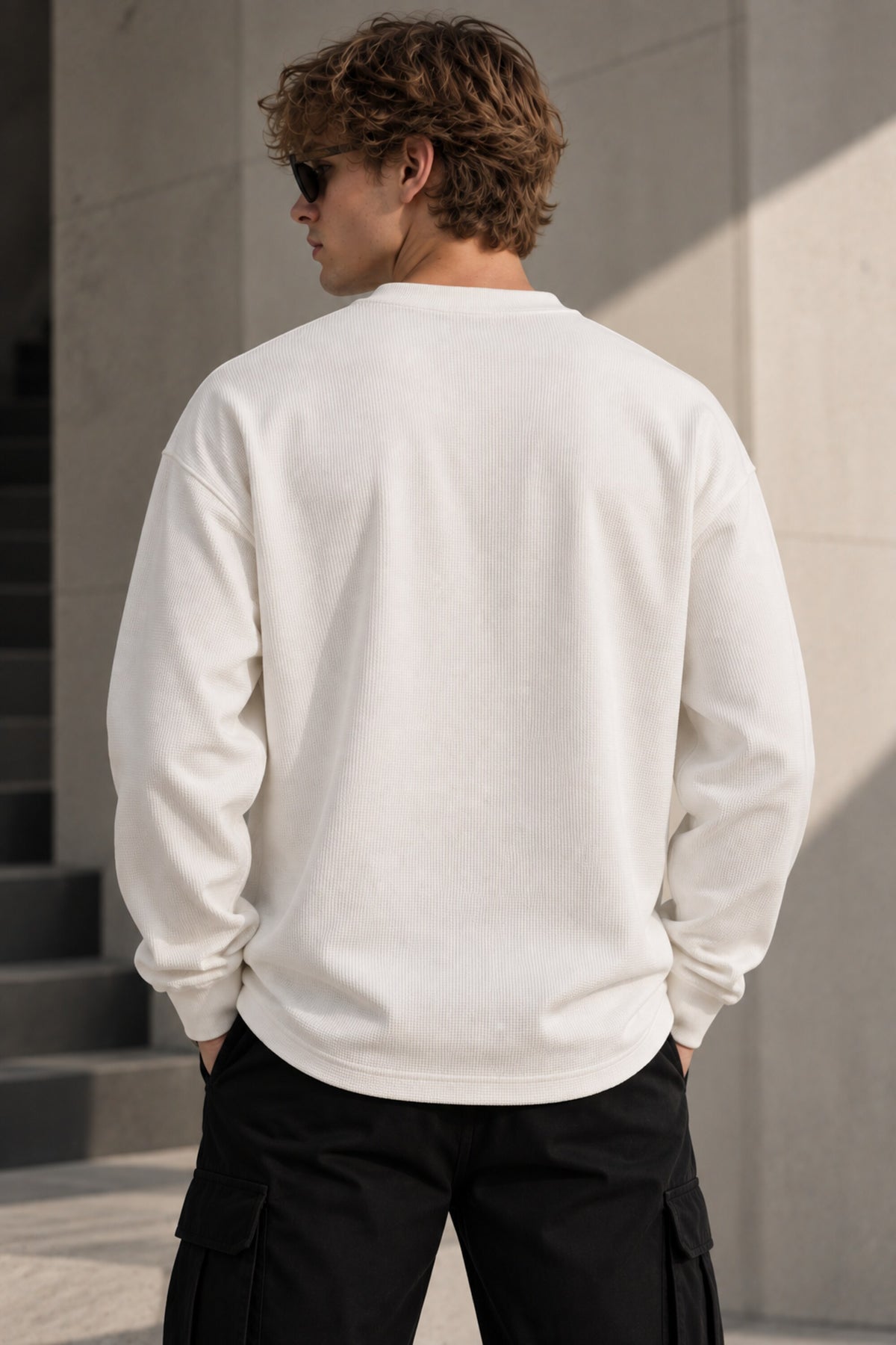 White waffle full sleeve tshirt with boxy fit, henley collar and Munich cursive script print on chest, men India