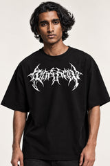Black oversized tshirt with death metal text on front and white dark angel wings spine graphic on back, drop shoulder boxy fit, men India
